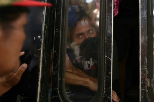 A student of the National Autonomous University of Nicaragua (UNAN), who hid in a church besieged by government forces, arrives on a bus with fellow students at the Cathedral in Managua after church mediation secured their release