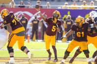 Arizona State quarterback Jayden Daniels (5) throws down field against Arizona in the first half during an NCAA college football game, Saturday, Nov. 27, 2021, in Tempe, Ariz. (AP Photo/Rick Scuteri)