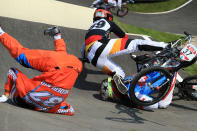 (L-R) Jelle Van Gorkom of Netherlands, Maik Baier of Germany, and Tory Nyhaug of Canada crash during the Men's BMX Cycling Quarter Finals on Day 13 of the London 2012 Olympic Games at BMX Track on August 9, 2012 in London, England. (Getty Images)