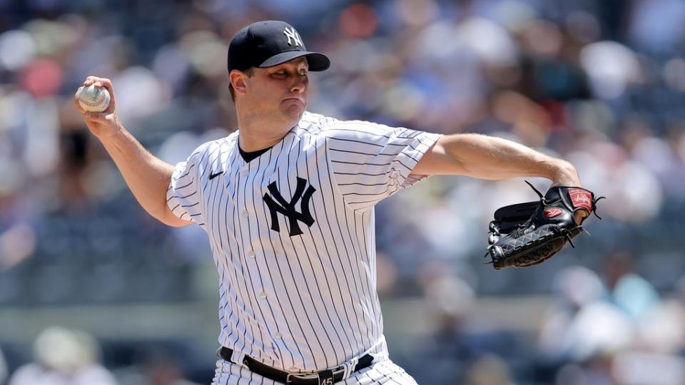 Jul 22, 2023;  Bronx, New York, USA;  New York Yankees starting pitcher Gerrit Cole (45) pitches against the Kansas City Royals in the second inning at Yankee Stadium.