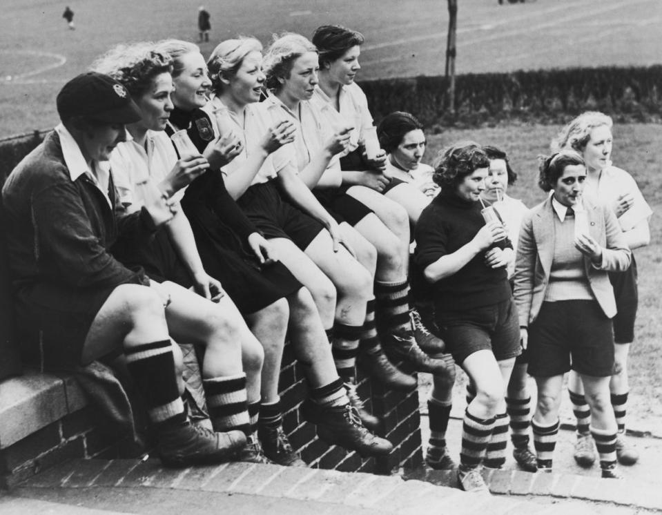 1939: Members of Preston Ladies' Football Club take a break to enjoy their milk ration (Getty Images)