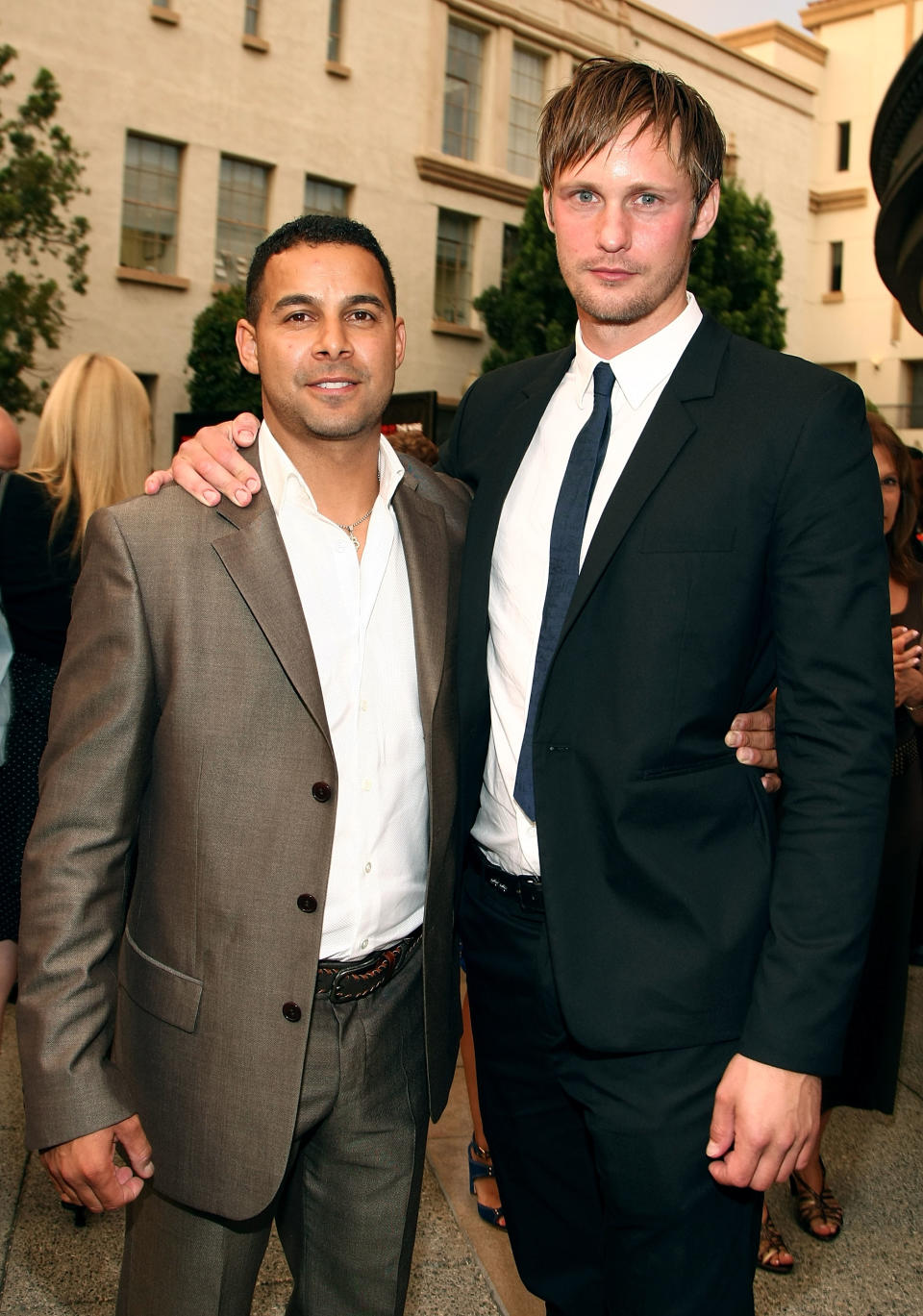 HOLLYWOOD - JULY 08:  Actors John Huertas (L) and Alexander Skarsgard arrive at the HBO Films' premiere of the miniseries 