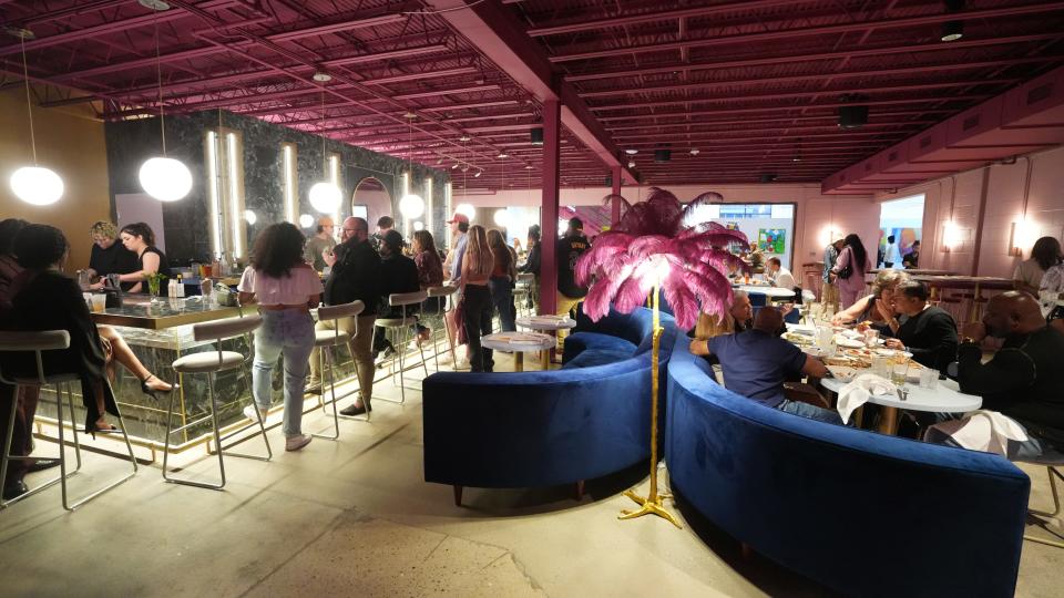 Diners enjoy the Lounge inside The Kee, a new restaurant, community center and event space in the "warehouse district" of Columbus.