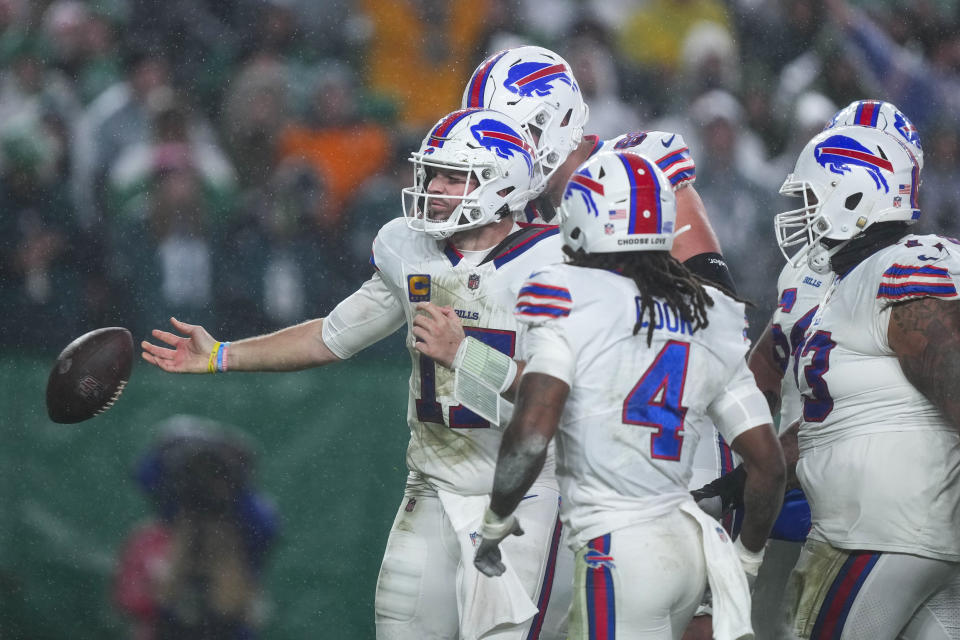 Buffalo Bills quarterback Josh Allen celebrates after scoring against the Philadelphia Eagles during the first half of an NFL football game Sunday, Nov. 26, 2023, in Philadelphia. (AP Photo/Matt Rourke)