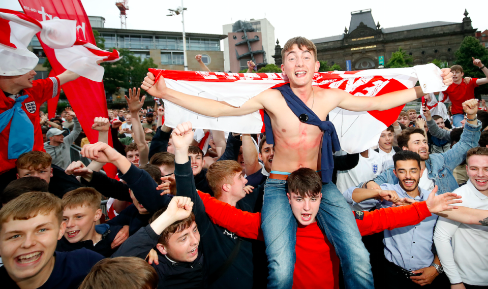 <p>England fans scream with delight at Millennium Square in Leeds.<br>(Picture: PA) </p>