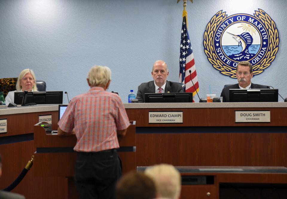 Martin County Commissioners (from left) Sarah Heard, Edward Ciampi and Doug smith listen to the comments from Bob Gordon during  the public hearing to consider the proposed rural lifestyle land-use designation during the commission meeting on Tuesday, Sept. 13, 2022, in Stuart.