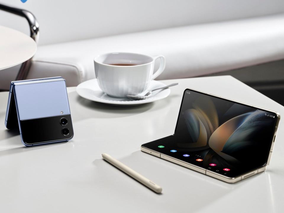 The Samsung Galaxy Z Flip 4 and Z Fold 4 foldable smartphones on a table.