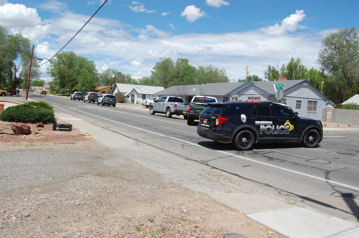 Dozens of law enforcement officers from the Farmington Police Department, San Juan County Sheriff's Office and New Mexico State Police were on the scene of a May 15, 2023, shooting on North Dustin Avenue in Farmington.