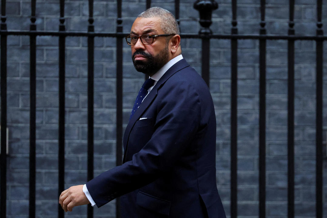 FILE PHOTO: British Home Secretary James Cleverly walks outside 10 Downing Street in London, Britain, December 19, 2023. REUTERS/Toby Melville/File Photo