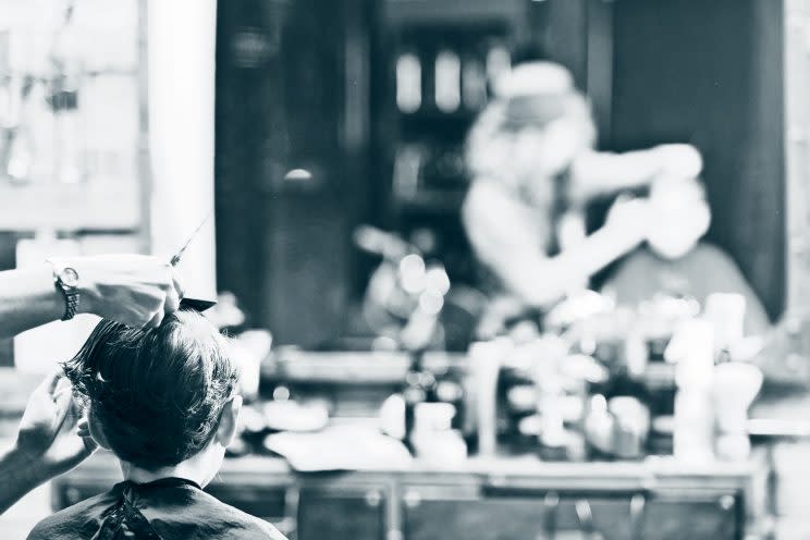 Boy getting his hair cut