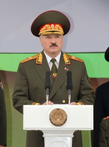 Belarus' President Alexander Lukashenko speaks in Minsk during a military parade. Belarussian police fired tear gas, beat up activists and arrested dozens Sunday to thwart a major opposition protest in Minsk against the rule of authoritarian President Alexander Lukashenko