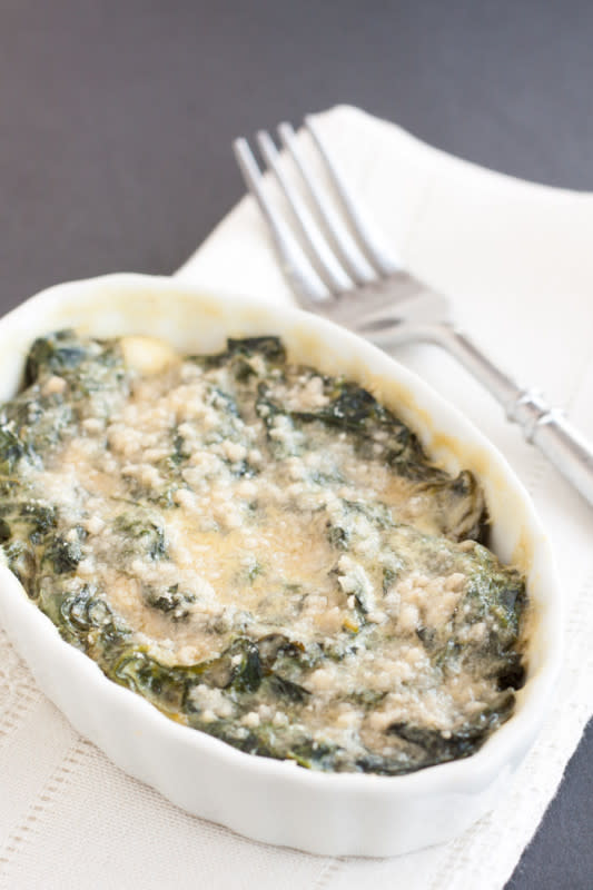 <p>Cupcakes & Kale Chips</p><p>A little lighter, but just as creamy and you can make individual servings or double it for a family-size casserole. Get this <a href="https://cupcakesandkalechips.com/creamed-spinach-au-gratin/" rel="nofollow noopener" target="_blank" data-ylk="slk:Lightened Up Creamed Spinach au Gratin;elm:context_link;itc:0;sec:content-canvas" class="link ">Lightened Up Creamed Spinach au Gratin</a> recipe!</p>