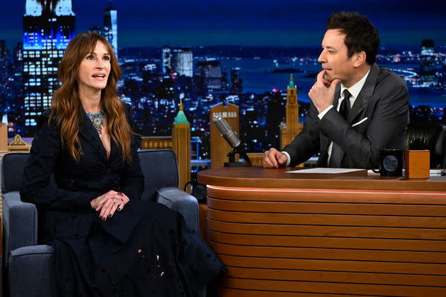 <p>Todd Owyoung/NBC via Getty</p> Julia Roberts during an interview with host Jimmy Fallon, December 2023