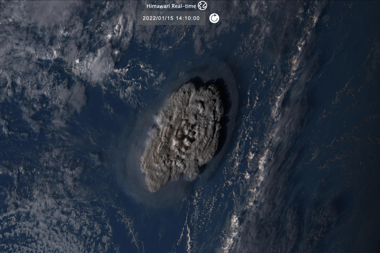 This satellite image taken by Himawari-8, a Japanese weather satellite operated by Japan Meteorological Agency and released by National Institute of Information and Communications Technology (NICT), shows an undersea volcano eruption at the Pacific nation of Tonga Saturday, Jan. 15, 2022. (NICT via AP)