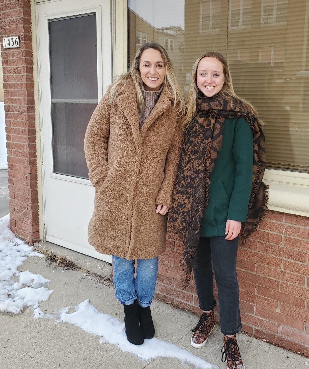 The Schneider sisters of West Allis, Samantha (left) and Skylar, both professional cyclists, are shown in front of the building that will house The Bread Pedalers, a new bakery and café they're planning to open in spring 2022 at 1436 S. 92nd St. in West Allis.