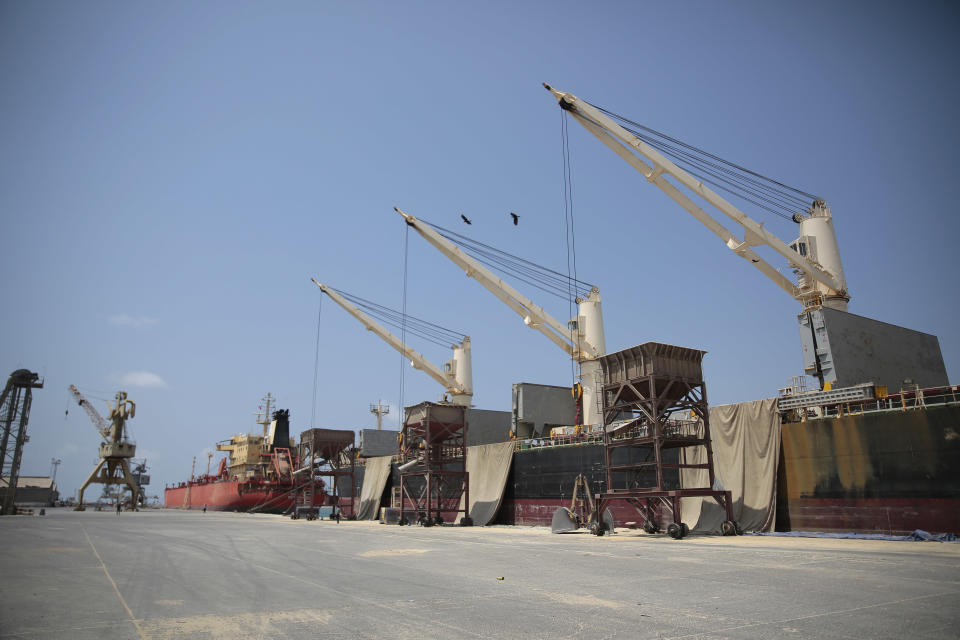 In this Saturday, Sept. 29, 2018 photo, cargo ship and oil tanker ship are idle at the port of Hodeida, Yemen. With US backing, the United Arab Emirates and its Yemeni allies have restarted their all-out assault on Yemen’s port city of Hodeida, aiming to wrest it from rebel hands. Victory here could be a turning point in the 3-year-old civil war, but it could also push the country into outright famine. Already, the fighting has been a catastrophe for civilians on the Red Sea coast. (AP Photo/Hani Mohammed)