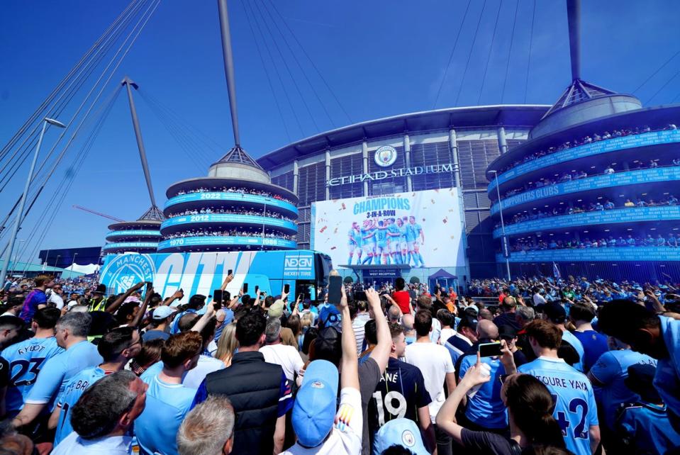 Manchester City fans outside the Etihad Stadium for their final home game of the season  (PA)