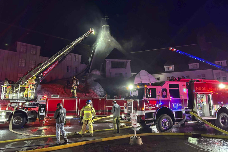 Firefighters extinguish a fire at Oregon's historic Timberline Lodge, which was featured in Stanley Kubrick's 1980 film "The Shining," Thursday evening, April 18, 2024, in Government Camp, Ore. (Clackamas Fire Department via AP)