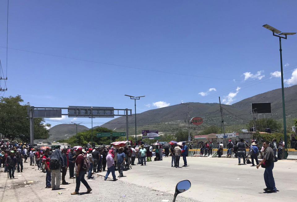 Demonstrators block the highway that connects Mexico City and Acapulco, in Chilpancingo, Mexico, Tuesday, July 11, 2023. According to officials the large demonstration that blocked the main highway and abducted several officials was organized by a drug gang aiming to force the government´s release of two detained gang leaders who have been charged with drug and weapons possession. (AP Photo/Alejandrino Gonzalez)