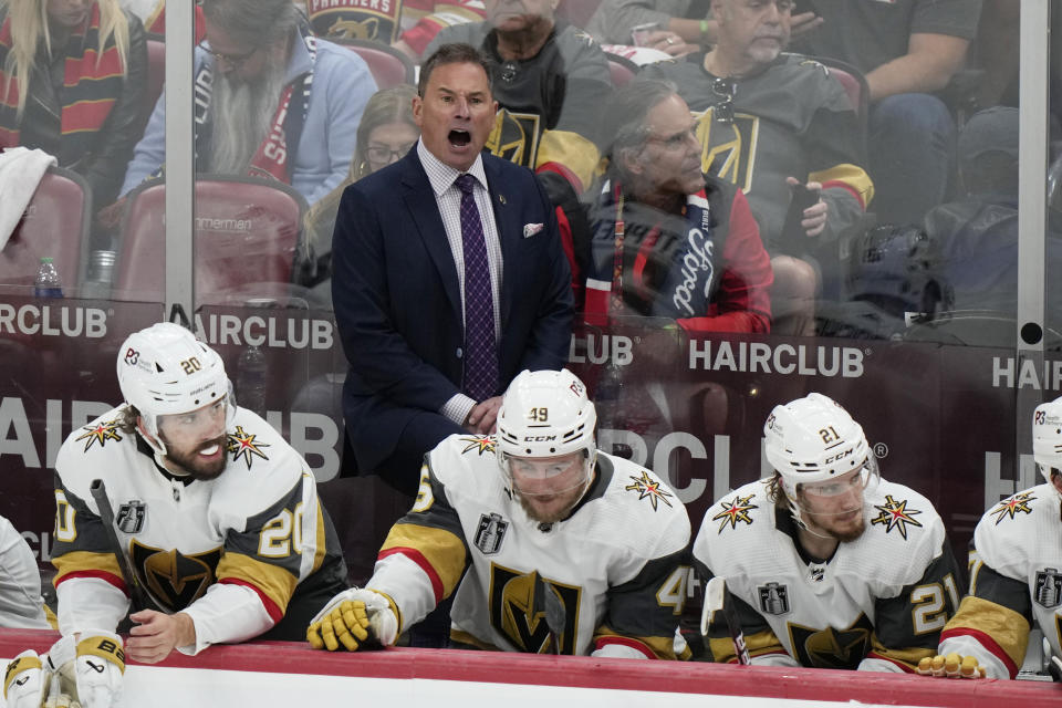 FILE - Vegas Golden Knights head coach Bruce Cassidy yells during the second period in Game 4 of the NHL hockey Stanley Cup Finals against the Florida Panthers, Saturday, June 10, 2023, in Sunrise, Fla. Vegas opened training camp Thursday with nearly the identical team that won the championship three months ago. (AP Photo/Wilfredo Lee, File)