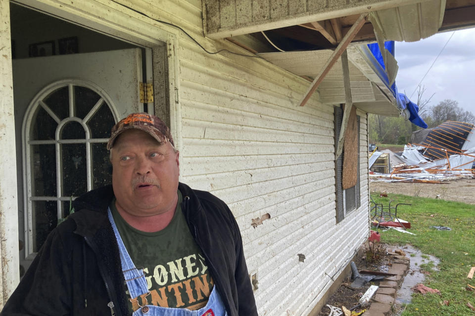 Keith Lincoln stands outside his damaged home in Glen Allen, Mo., on Wednesday, April 5, 2023. A large tornado tore through southeastern Missouri before dawn on Wednesday, killing several people and causing widespread destruction. (AP Photo/Jim Salter)