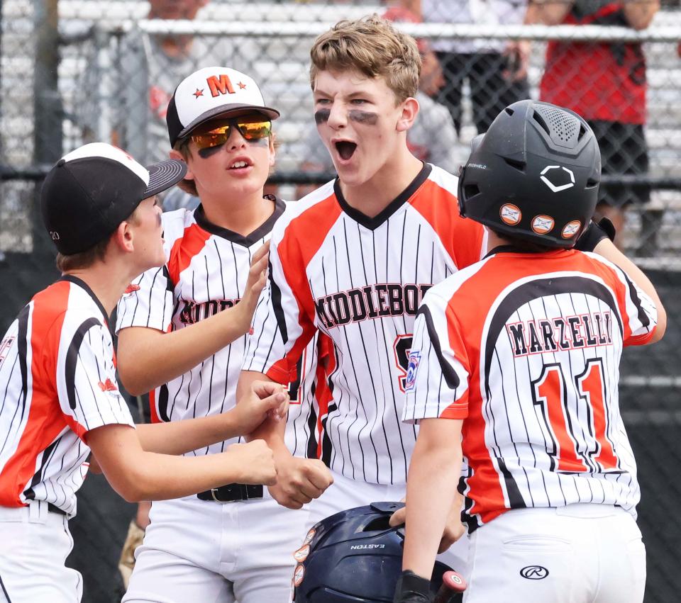 Middleboro 12U Nationals Jayden Murphy, center, led the game off with a home run versus Concord, New Hampshire at Bartlett Giamatti Little League Leadership Training Center in Bristol, Connecticut for the New England Regional tournament on Wednesday, August  10, 2022.