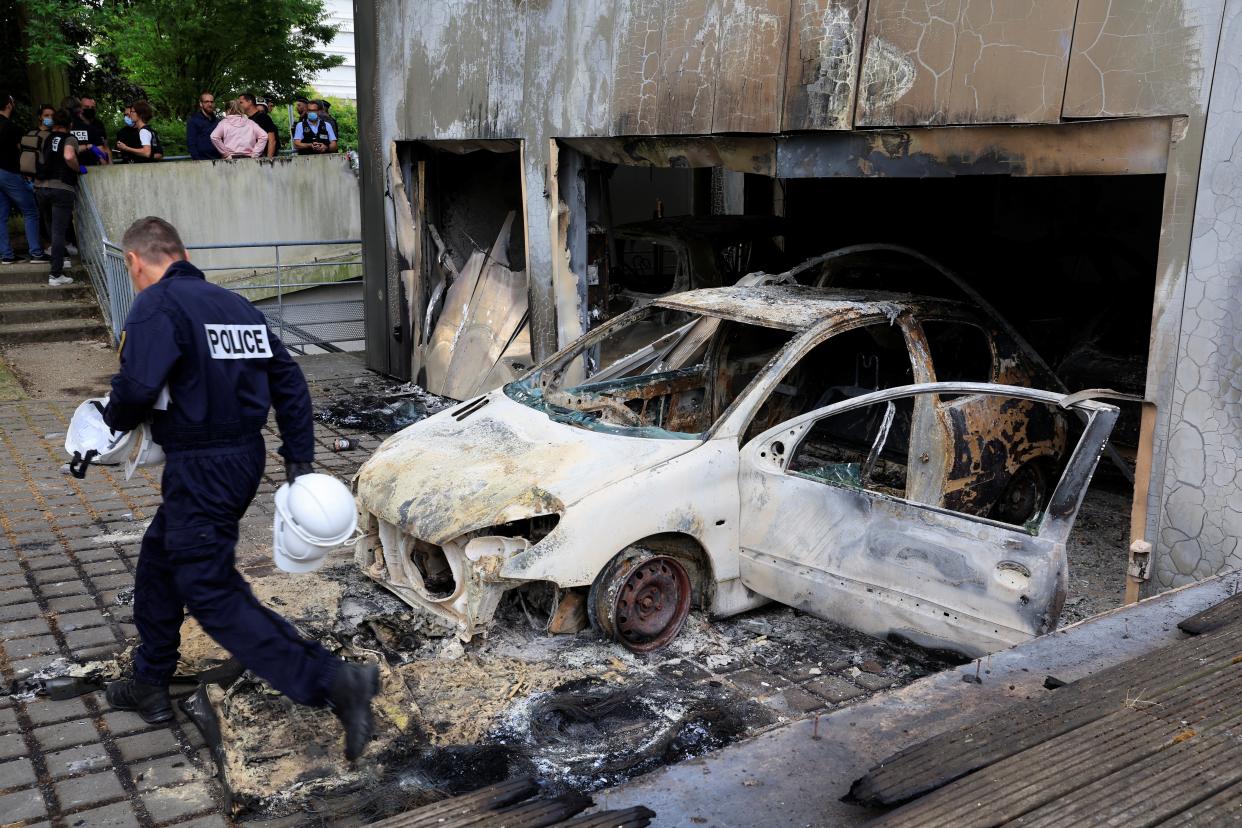 Aftermath after clashes break out between protesters and police in Mons-en-Baroeul northern France (Reuters)