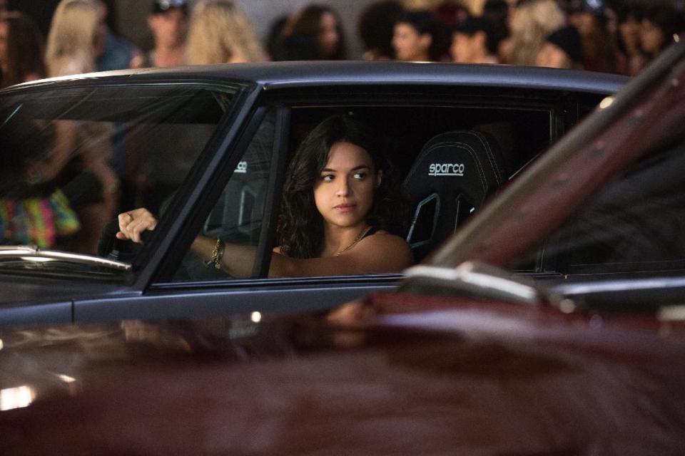 This film publicity image released by Universal Pictures shows Michelle Rodriguez in a scene from "Fast & Furious 6." (AP Photo/Universal Pictures, Giles Keyte)