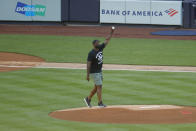 Former New York Yankees pitcher C.C. Sabathia gestures before throwing out the first pitch before the baseball game against the Boston Red Sox at Yankee Stadium, Friday, July 31, 2020, in New York. (AP Photo/Seth Wenig)