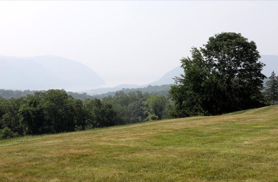 A hazy view looking toward the Hudson River from the future site of the Hudson Valley Shakespeare Festival open-air pavilion in Garrison. Gov. Kathy Hochul earmarked a $10 million state grant to help the festival realize its planned permanent home. Those plans are now before Philipstown's planning and conservation boards.