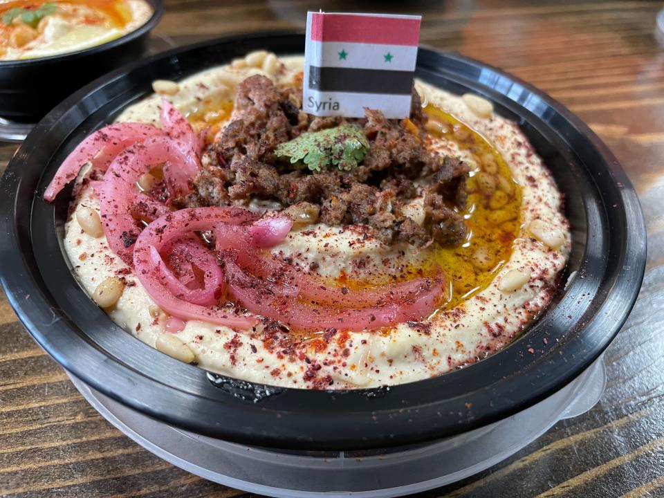 Hummus Hut's Syrian cuisine-inspired hummus dish is shown Thursday, Nov. 30, 2023 at the Middle Eastern eatery in Brighton
