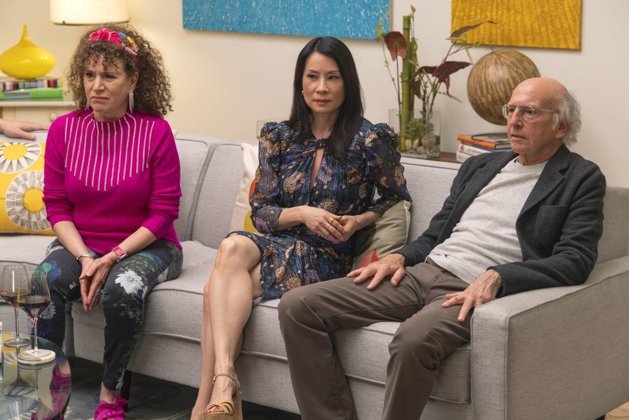Susie Essman, Lucy Liu and Larry David appear together in a scene from Season 11 of "Curb Your Enthusiasm."