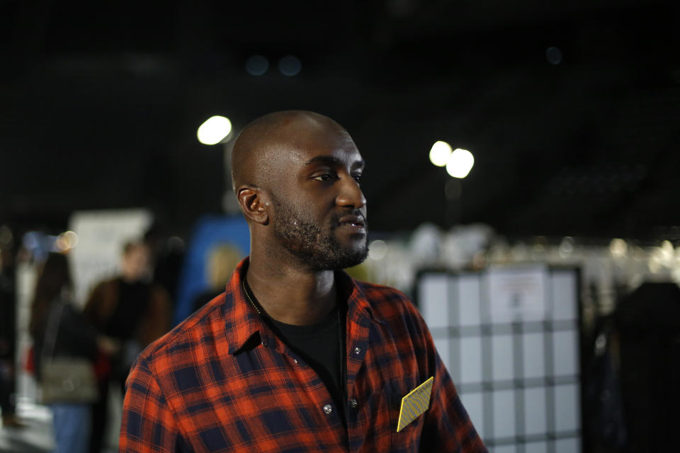 Designer Virgil Abloh walks backstage prior to his Off-White ready to wear Fall-Winter 2019-2020 collection, that was presented in Paris, Thursday, Feb. 28, 2019. (AP Photo/Thibault Camus)