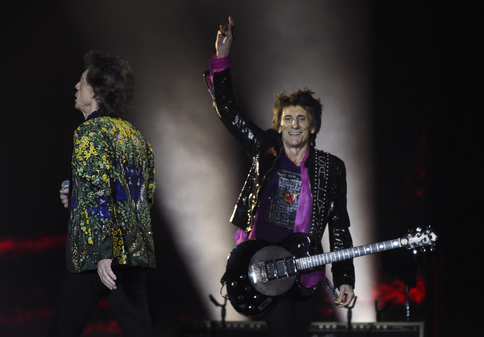 Ron Wood, right, and Mick Jagger of the Rolling Stones perform during the group's concert at the Rose Bowl, Thursday, Aug. 22, 2019, in Pasadena, Calif. (Photo by Chris Pizzello/Invision/AP)