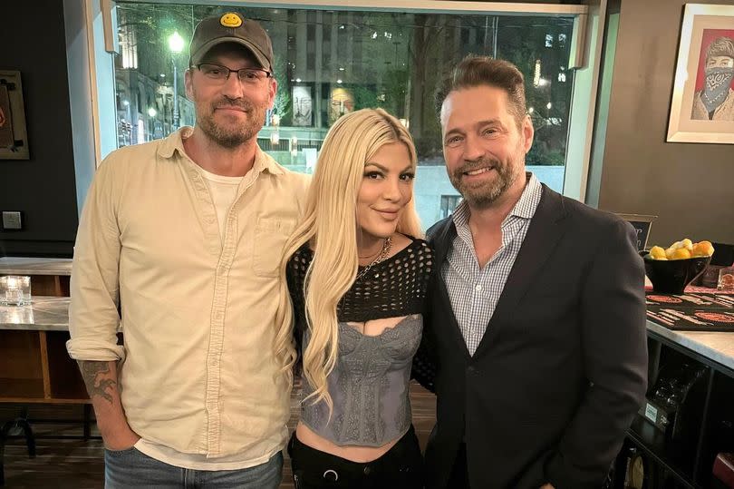 Tori Spelling shared a snapshot of herself sandwiched between her Beverly Hills, 90210 co-stars