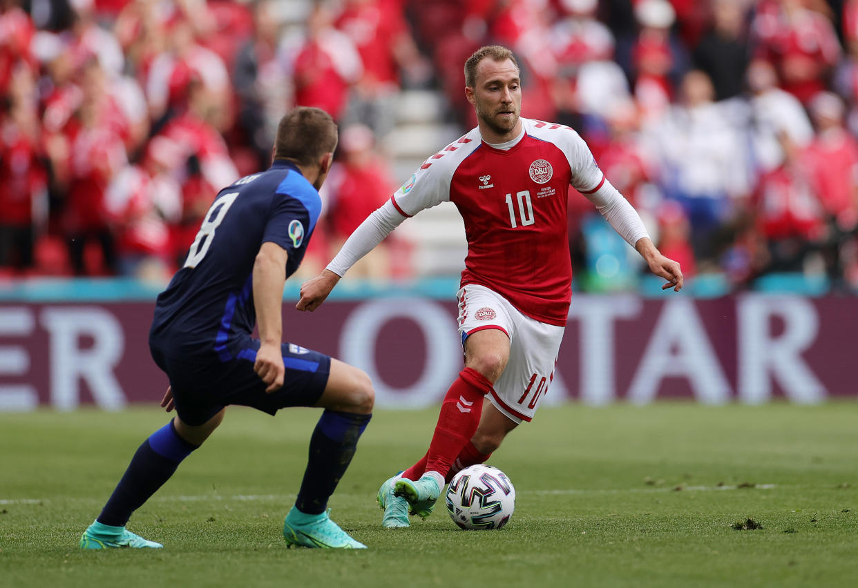 COPENHAGEN, DENMARK - JUNE 12: Christian Eriksen of Denmark runs with the ball during the UEFA Euro 2020 Championship Group B match between Denmark and Finland on June 12, 2021 in Copenhagen, Denmark. (Photo by Friedemann Vogel - Pool/Getty Images)