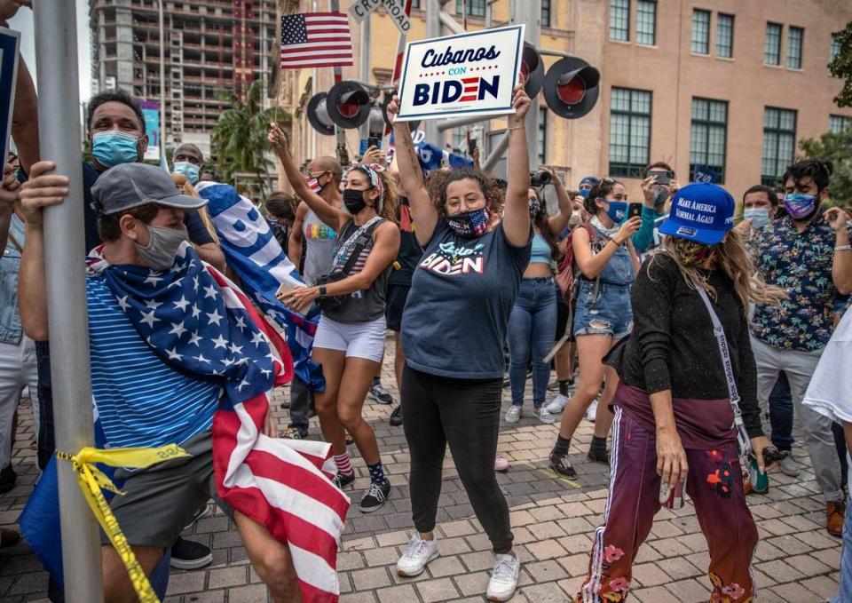 Celebrations break out along Biscayne Blvd after Joe Biden wins the presidency over President Trump in Miami on Saturday, November 7, 2020.