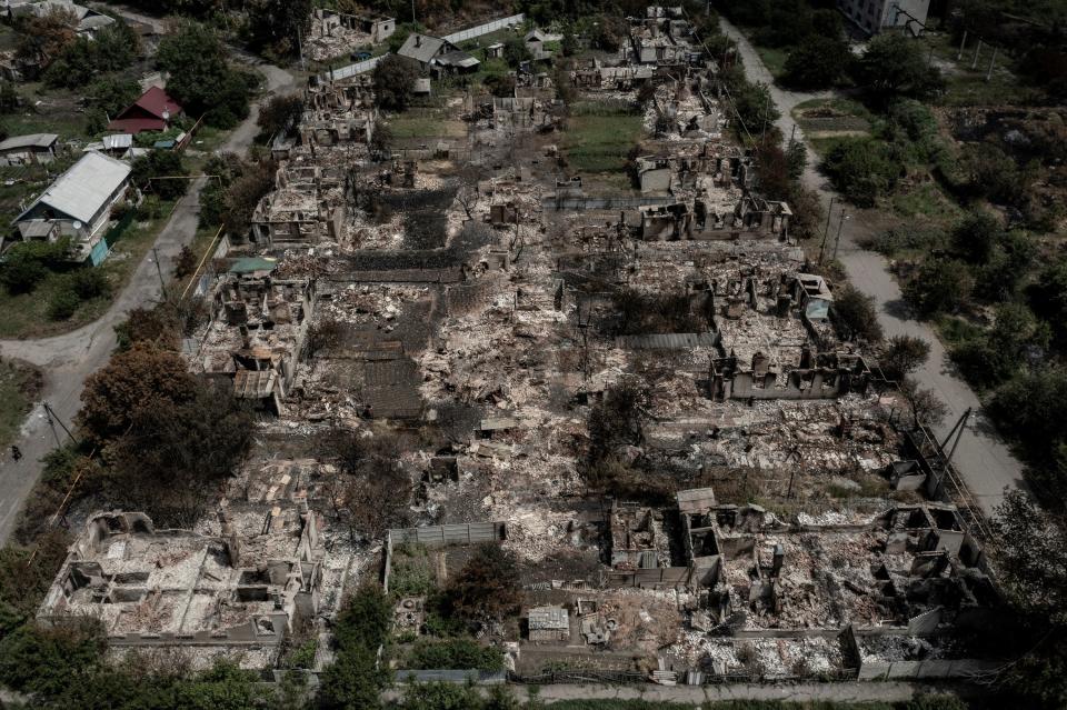 Continuous shelling and artillery attack in Donbas’s town shows an entire block flattened in this aerial view (AFP via Getty Images)