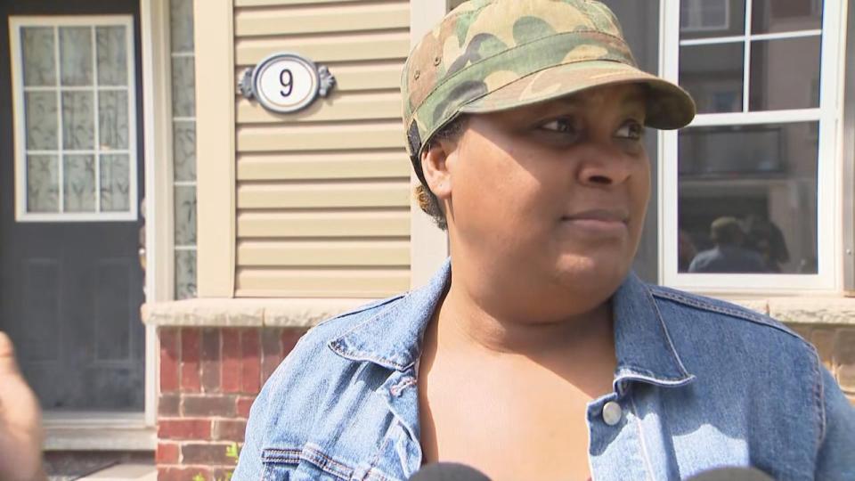 Michelle Smith says she has lived in the neighbourhood for over 10 years and has never seen 'this many cops, ever.'