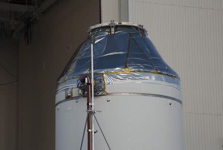 The Orion capsule is pictured as it is moved from the Operations & Checkout Building to the Payload Hazardous Servicing Facility at Kennedy Space Center, Florida September 11, 2014. REUTERS/Mike Brown