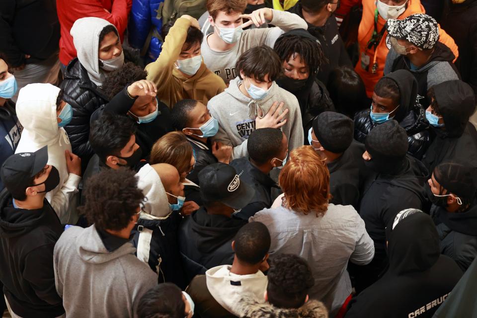 <p>Shoppers wait for a video games store to open on Black Friday, at the Tysons Corner Center in Virginia on 27 November, 2020 </p> (REUTERS)