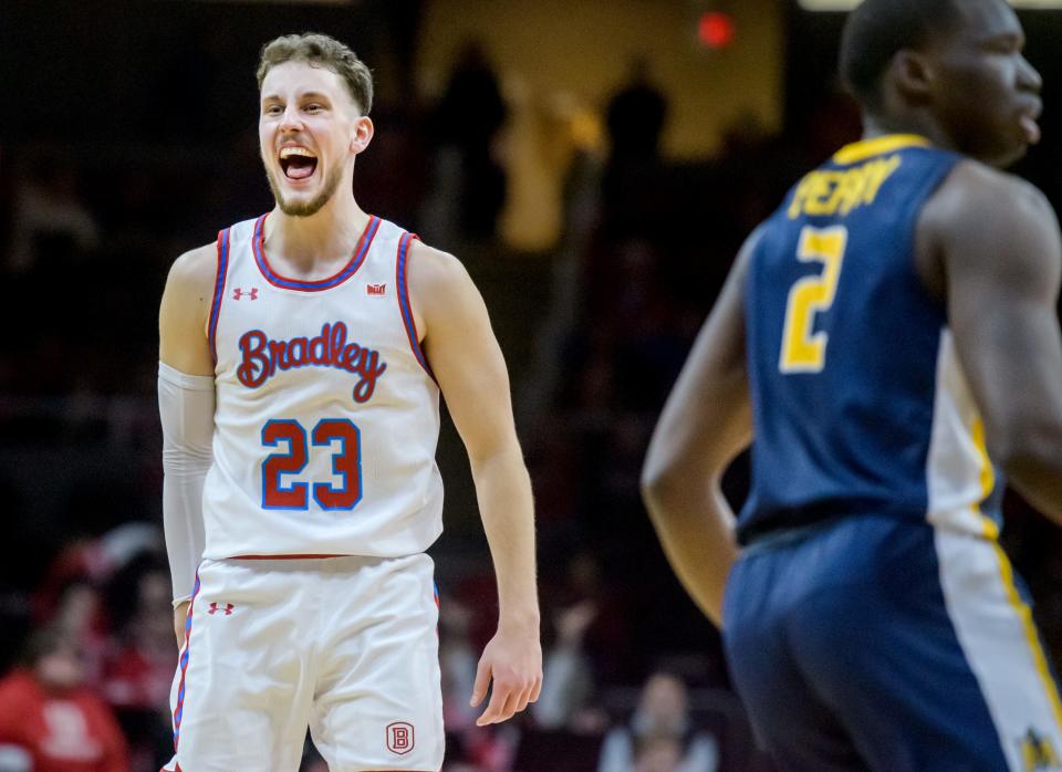 Bradley's Ville Tahvanainen celebrates after his fifth consecutive three-pointer late in the second half against Murray State on Saturday, Feb. 11, 2023 at Carver Arena. The Braves rolled over the Racers 83-48.