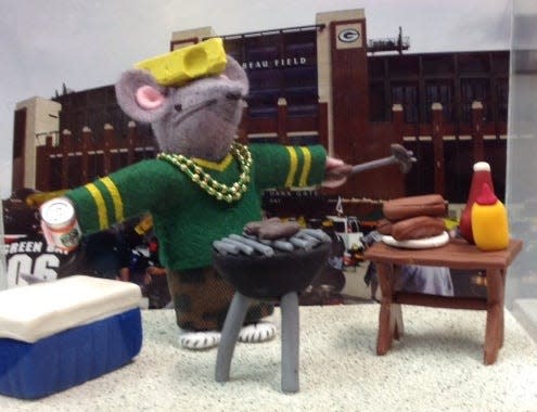 “Tail-gating” is a one-of-a-kind raffle mouse from 2014 at the St. Nicholas Faire at the Cathedral of St. Paul.