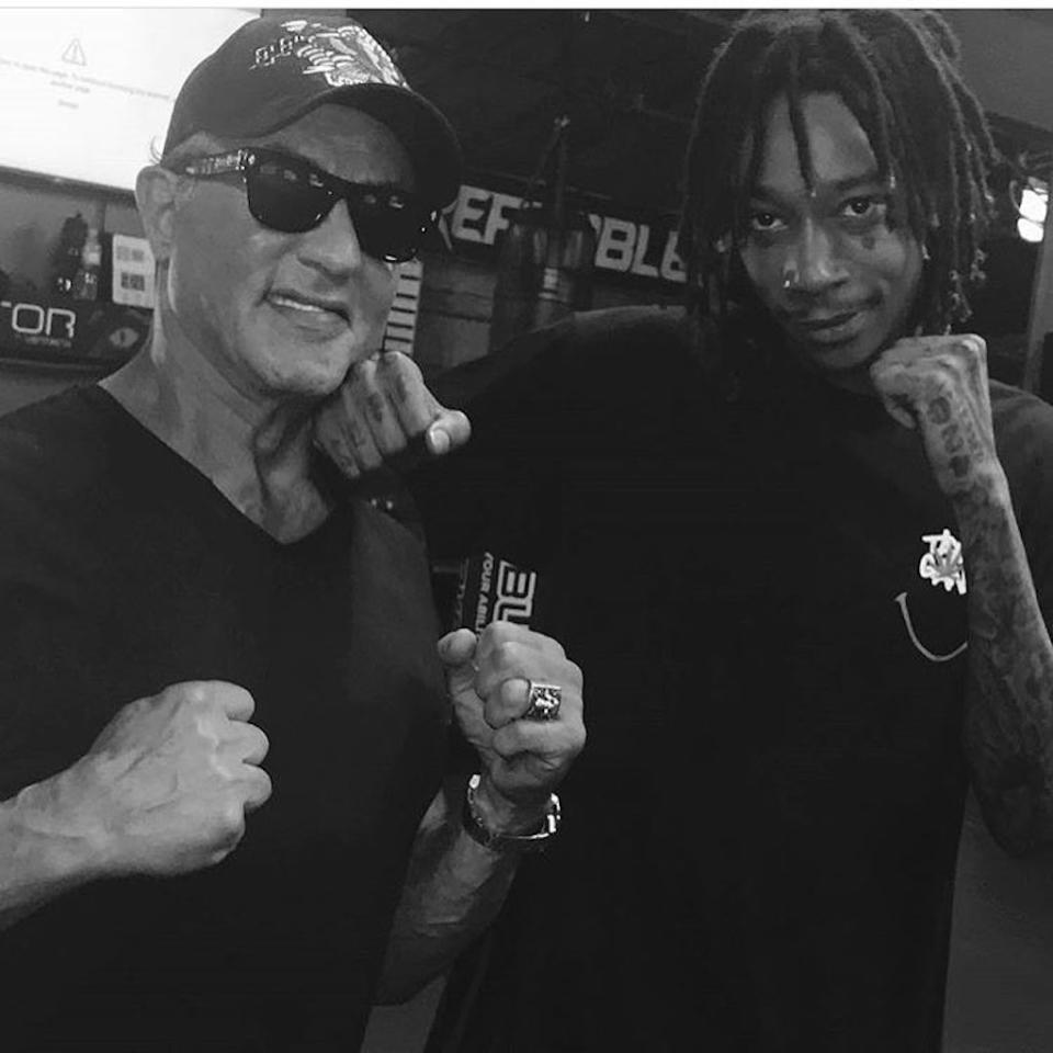 <p>Hit me with your best shot! The rapper joked around with none other than Sylvester Stallone after a workout at the Unbreakable Performance Center in West Hollywood. “<span>didnt really punch him,” wrote Khalifa. “Great work out today with some legends.” </span>(Photo: <a rel="nofollow noopener" href="https://www.instagram.com/p/BUcswhPDZj6/" target="_blank" data-ylk="slk:Wiz Khalifa via Instagram;elm:context_link;itc:0;sec:content-canvas" class="link ">Wiz Khalifa via Instagram</a>) </p>