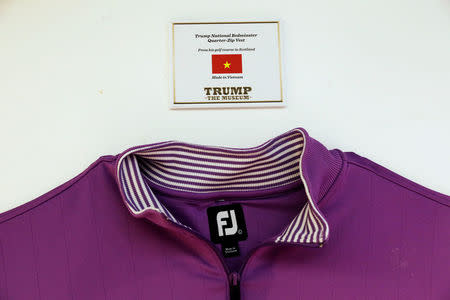 A Trump branded shirt hangs below a tag showing where it was made at theThe Trump Museum near the Republican National Convention in Cleveland, Ohio, U.S., July 19, 2016. REUTERS/Lucas Jackson