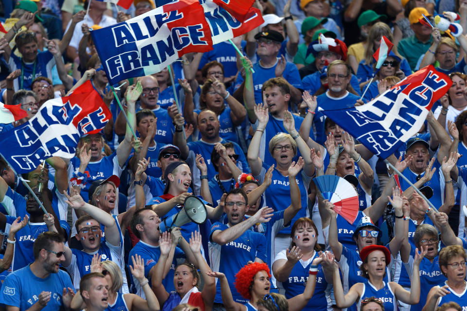 French fans cheer for compatriot Kristina Mladenovic during her match against Australia's Ajla Tomljanovic during their Fed Cup tennis final in Perth, Australia, Saturday, Nov. 9, 2019. (AP Photo/Trevor Collens)
