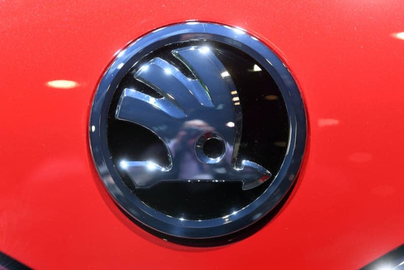 A Skoda logo is seen on a car's hood during the second day of the 89th Geneva Motor Show. The Czech VW subsidiary Skoda plans to enter the affordable electric-car segment with a new all-electric small vehicle, according to its boss on Friday. Uli Deck/dpa