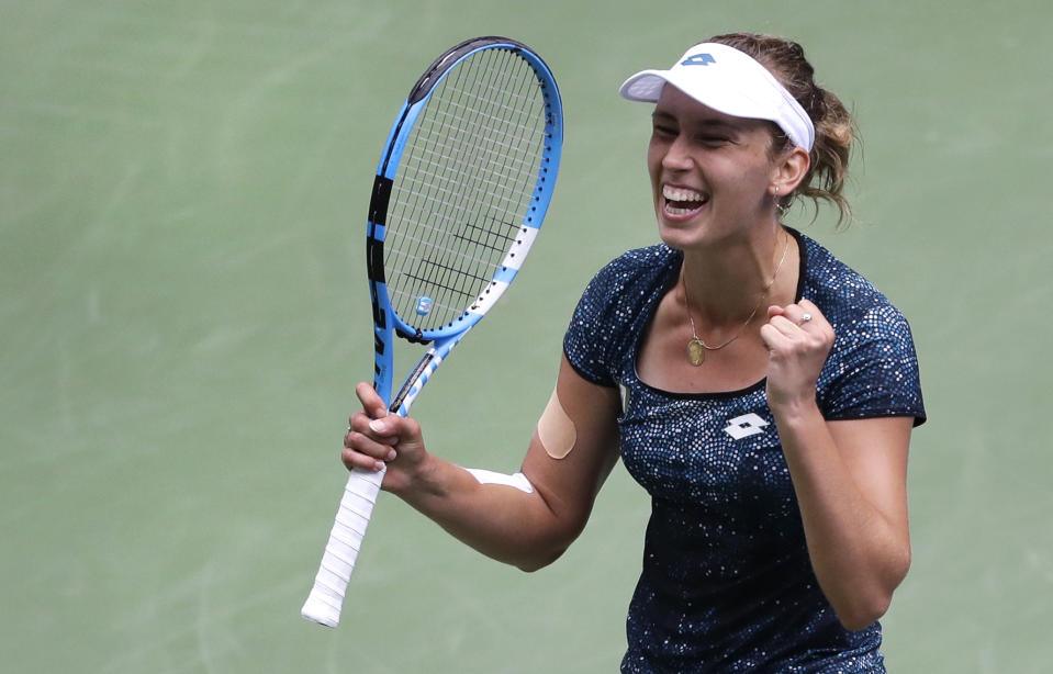 Elise Mertens, of Belgium, reacts after defeating Barbora Strycova, of the Czech Republic, during the third round of the U.S. Open tennis tournament, Friday, Aug. 31, 2018, in New York. (AP Photo/Seth Wenig)