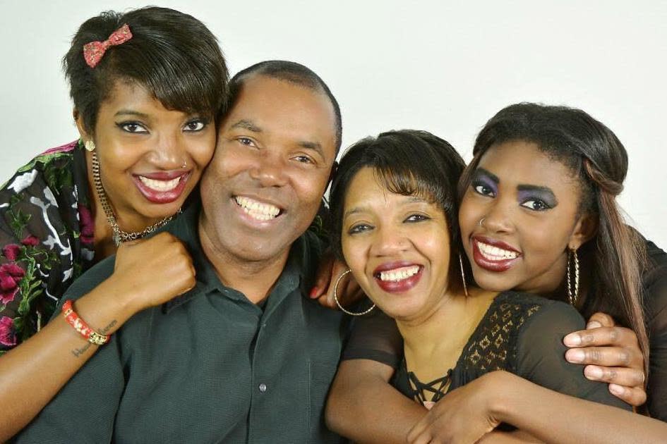 Martin Goode, with wife Caroline, and his two daughters Natalie (left) and Cherelle (right) (Natalie Goode)