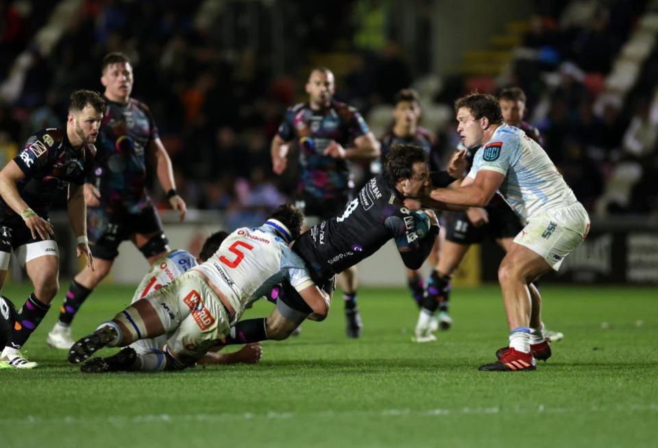 South Wales Argus: Rhodri Williams runs for Dragons against Bulls